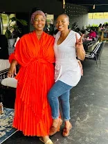 Two guests dressed up celebrating an occasion at Eraa Village